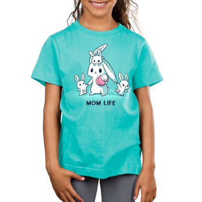 Premium Cotton T-shirt_TeeTurtle Mom Life caribbean blue t-shirt featuring a tired mom bunny surrounded by three little bunnies while she holds a sleeping baby bunny wrapped in a pink blanket. 