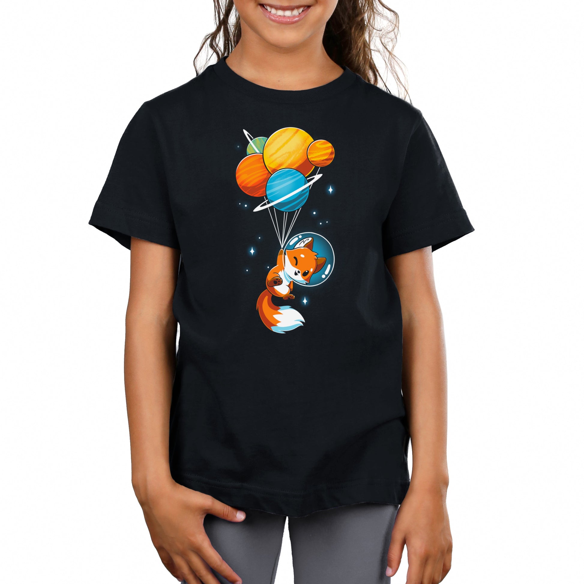 Premium Cotton T-shirt_A cartoon Foxy Astronaut in a space helmet is being lifted by balloons shaped like planets against a dark background. This whimsical design is printed on a super soft ringspun cotton Unisex Tee, perfect for space lovers of all ages. The Foxy Astronaut Unisex apparelby monsterdigital is sure to delight fans everywhere.