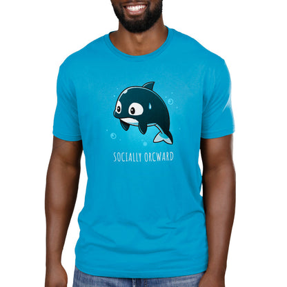 Premium Cotton T-shirt_TeeTurtle Orcward Cobalt Blue t-shirt featuring a cartoon of an orca with a nervous expression, a sweat drop on its head, and the text "SOCIALLY ORCWARD" below it. 