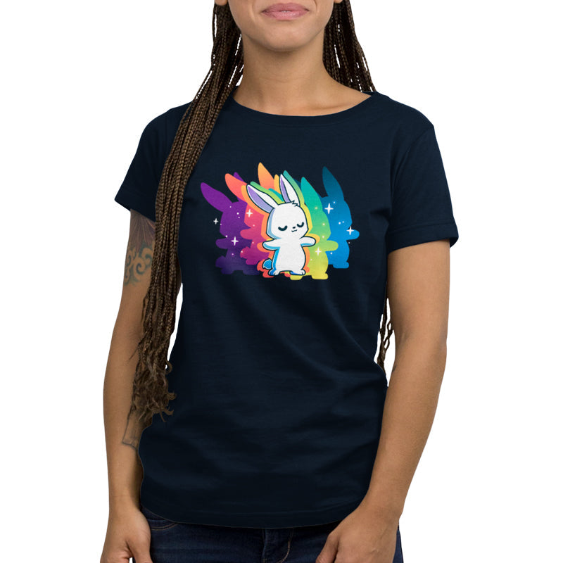 Premium Cotton T-shirt - A person is wearing a super soft ringspun cotton navy blue apparel featuring a cute white bunny with rainbow-colored wings and stars in the background from monsterdigital's "Queer Vibes Only" collection. The person has long braided hair and a tattoo on their left arm.