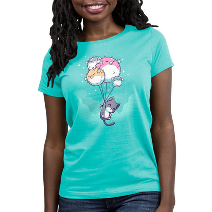 Premium Cotton T-shirt_TeeTurtle Sky High caribbean blue t-shirt featuring a cat holding onto strings attached to five pufferfish balloons floating against a turquoise sky.