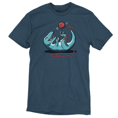 Premium Cotton T-shirt_TeeTurtle Velocikitty Denim t-shirt featuring an illustration of a velociraptor laying on its back, entangled in red yarn, playing happily with a ball of yarn above it in the air.