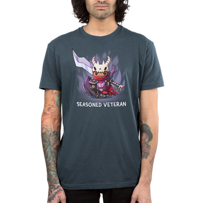 Premium Cotton T-shirt_TeeTurtle Seasoned Veteran denim blue t-shirt featuring a fantasy themed fighter dressed in moderately tattered garments and armor, wearing a skull, and carrying a large sword and shield.