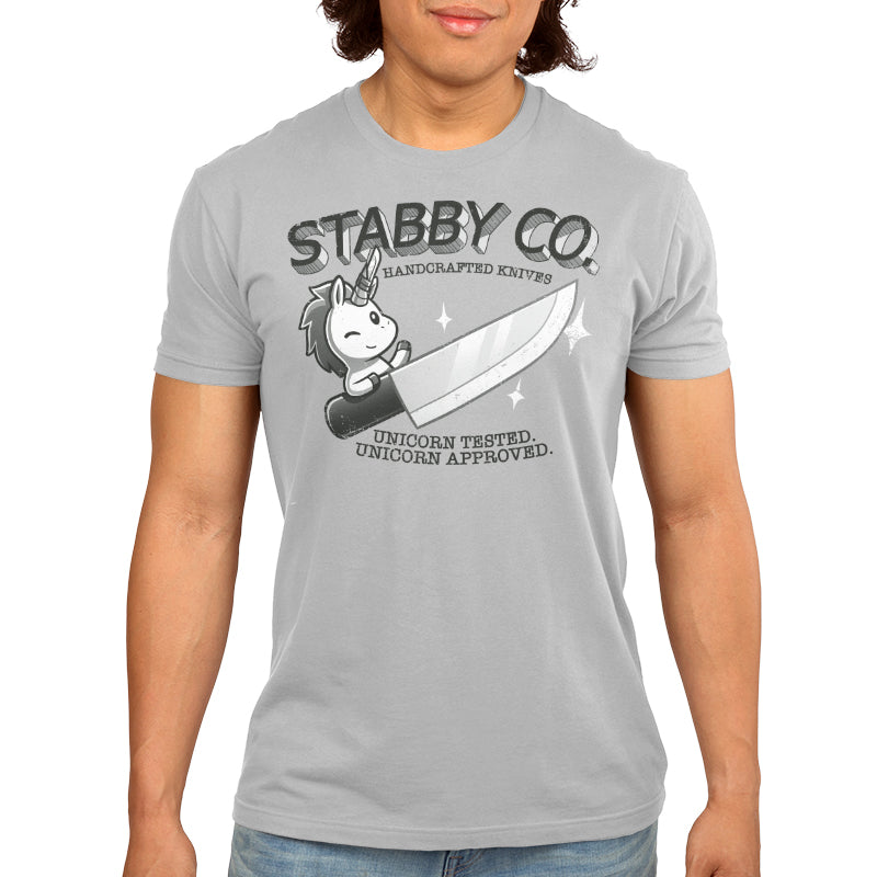 Premium Cotton T-shirt_TeeTurtle Stabby Co. Handcrafted Knives silver gray t-shirt featuring a logo of "Stabby Co." A unicorn is holding a large knife, with the text "Handcrafted Knives - Unicorn Tested. Unicorn Approved."