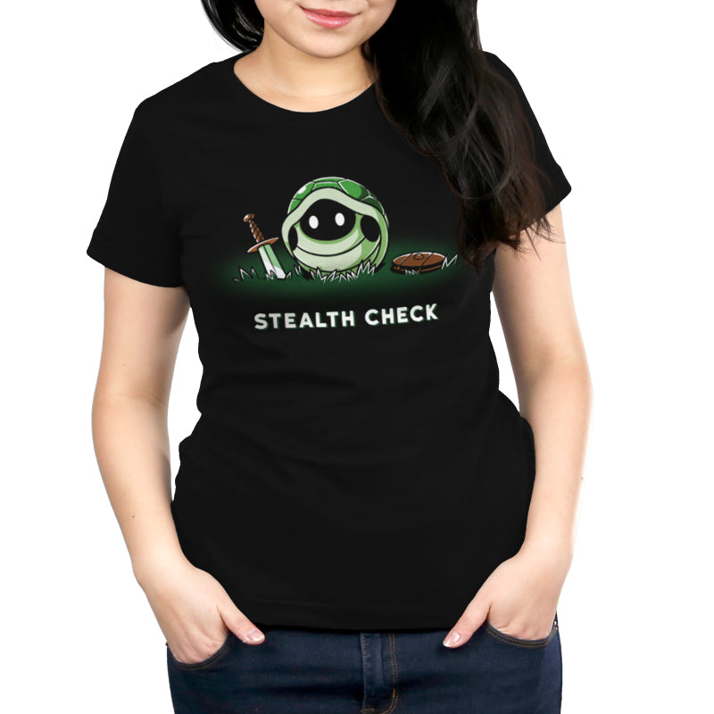 Premium Cotton T-shirt_TeeTurtle Stealth Check (Turtle) black t-shirt featuring a cartoon turtle shell with a fantasy sword and shield beside it and glowing white eyes inside the shell is accompanied by the text "Stealth Check".