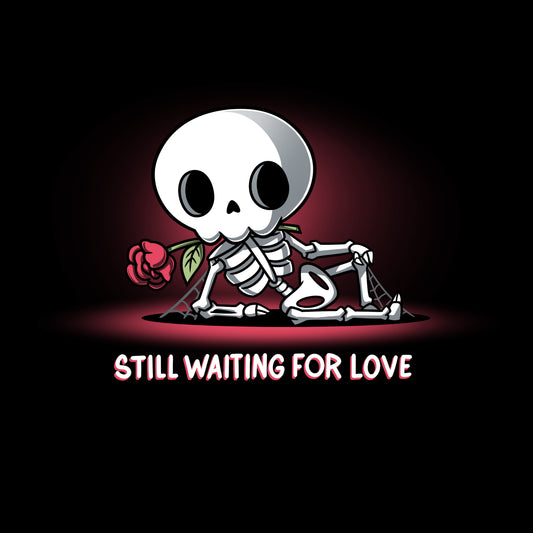 Premium Cotton T-shirt_TeeTurtle Still Waiting For Love black t-shirt featuring a skeleton holding a red rose and lying on the ground with the text 