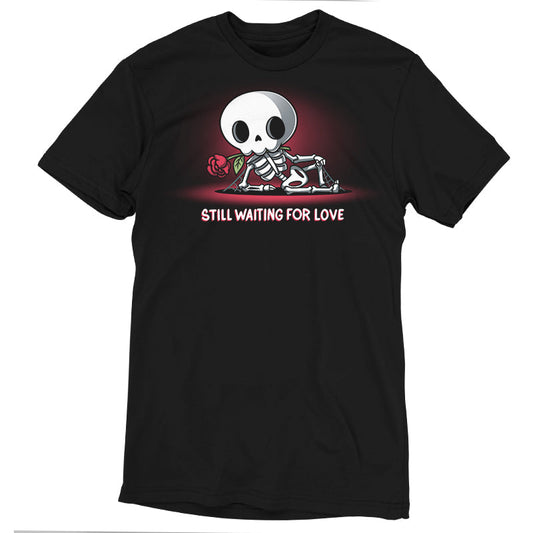 Premium Cotton T-shirt_TeeTurtle Still Waiting For Love black t-shirt featuring a skeleton holding a red rose and lying on the ground with the text 