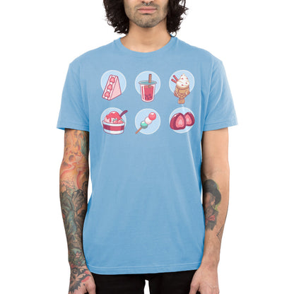 Premium Cotton T-shirt_ Sweet Treats light blue t-shirt featuring an illustration of various sweets, such as  a triangular strawberry cheesecake, pink boba drink, strawberry ice cream, a vanilla milkshake, a small stick of pink, white and green mochi balls, and a strawberry candy.