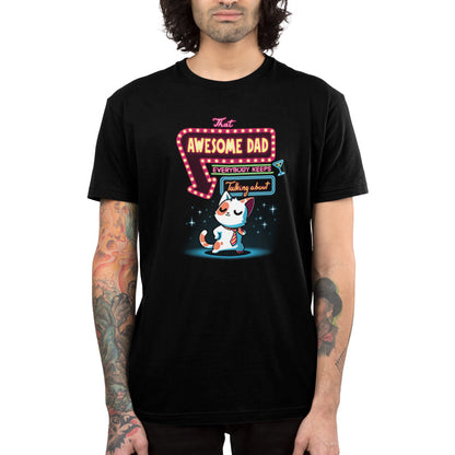 Premium Cotton T-shirt_TeeTurtle That Awesome Dad black t-shirt featuring a cat wearing a tie standing confidently under a neon sign that reads "That Awesome Dad Everybody Keeps Talking About" with an arrow pointing to the cat.