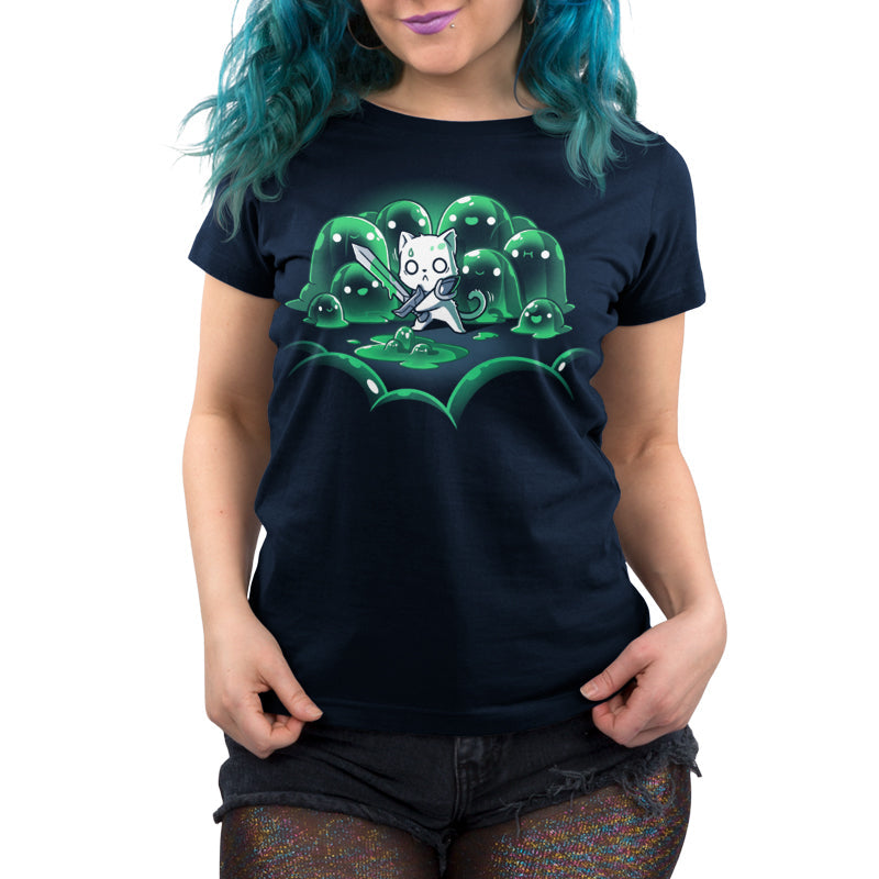 Premium Cotton T-shirt_TeeTurtle navy blue The Never-Ending Fight. Featuring a cat warrior holding a sword surprised at being surrounded by a group of green slimes.