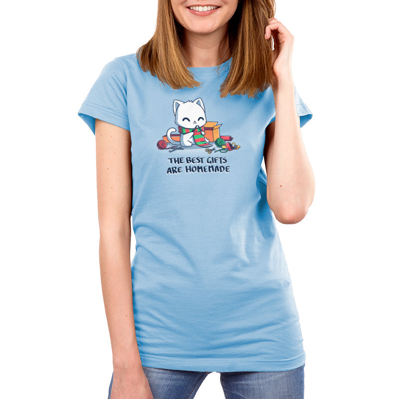 Premium Cotton T-shirt - featuring a smiley white cat surrounded by craft supplies, knitting a green and red stripped scarf