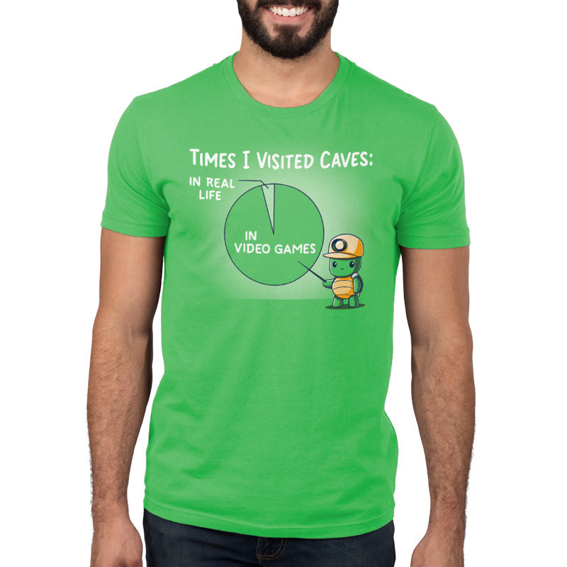 Premium Cotton T-shirt_Teeturtle Times I Visited Caves apple green t-shirt featuring a cute turtle in a miner's helmet pointing to a pie chart reading 'Times I Visited Caves' with 'In Real Life' as a small part of the chart and 'In Video Games' as the much larger part of the chart.