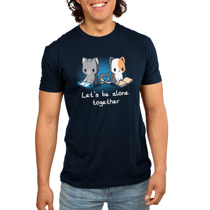 Premium Cotton T-shirt_Two cartoon cats, one gray playing a handheld game and the other orange and white reading a book, sit with their tails forming a heart shape. On this navy blue apparel made from 100% super soft ringspun cotton, the text reads, "Let's Be Alone Together." This delightful design is from monsterdigital's "Let's Be Alone Together" collection.