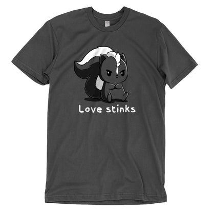 Premium Cotton T-shirt_A black and white cartoon skunk sits with a grumpy expression on this Love Stinks apparel by monsterdigital, made from super soft ringspun cotton. The phrase "Love stinks" is written below in white text, set against a charcoal gray apparelbackground.