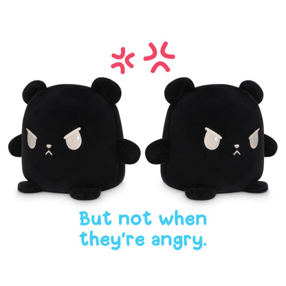 Two black TeeTurtle Reversible Bear Plushmate plush toys.