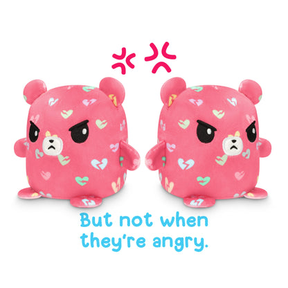 Two TeeTurtle Reversible Bear Plushmate plush toys in pink with the words "but not when they're angry".