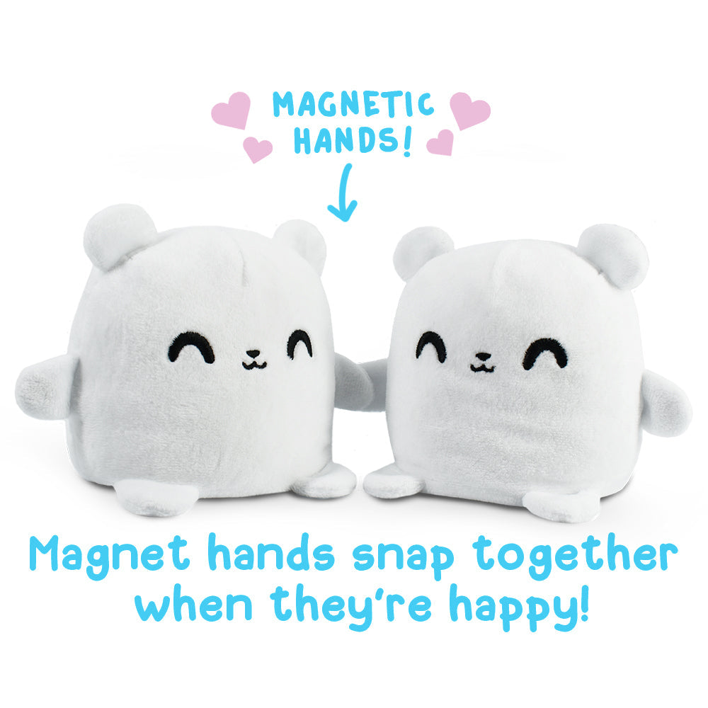 TeeTurtle presents the Reversible Bear Plushmate, an adorable plush toy with magnetic hands that snap together when it's happy.