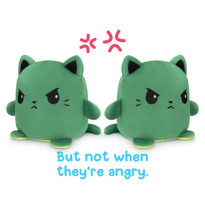 Two green TeeTurtle Reversible Cat Plushmates, with the words but not when they're angry.