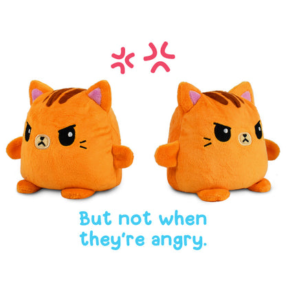 Two TeeTurtle Reversible Cat Plushmates, but not when they're angry.