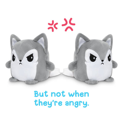 Two TeeTurtle Reversible Wolf Plushmate stuffed animals, but not when they're angry. These plush toys are perfect for someone who loves collecting unique and high-quality items.