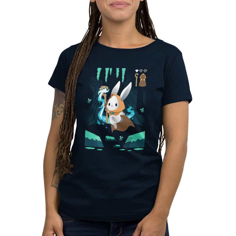 Premium Cotton T-shirt_TeeTurtle Mage Class navy blue t-shirt featuring an adventurous magical bunny holding a staff and skipping across a river and surrounded by fireflies. 