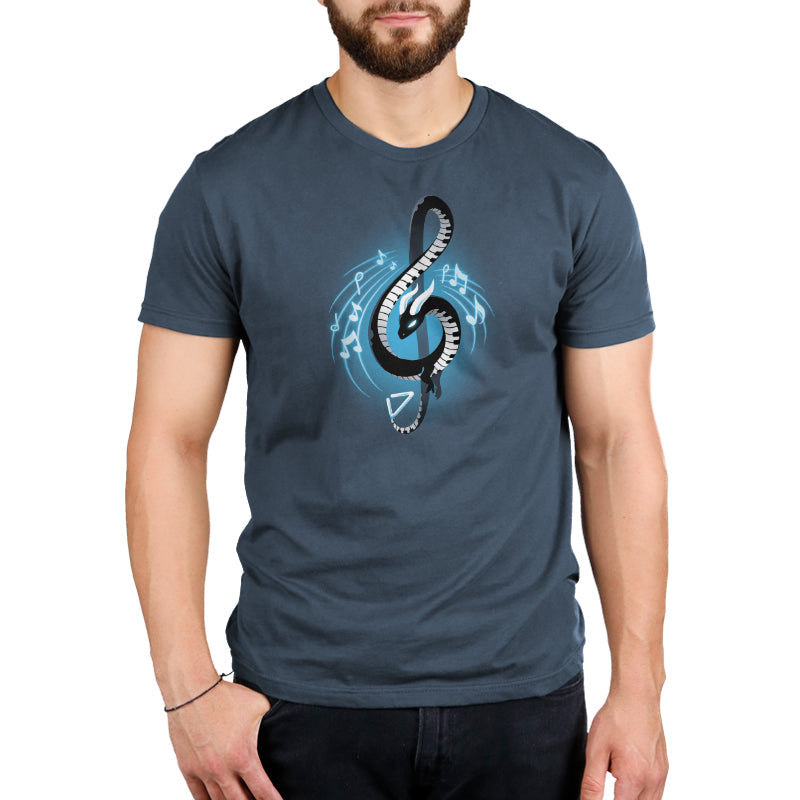 Premium Cotton T-shirt_TeeTurtle Musical Dragon denim blue t-shirt featuring a serpent-shaped musical dragon with piano key scales and white horns forming a treble clef, surrounded by musical notes on a dark blue background.