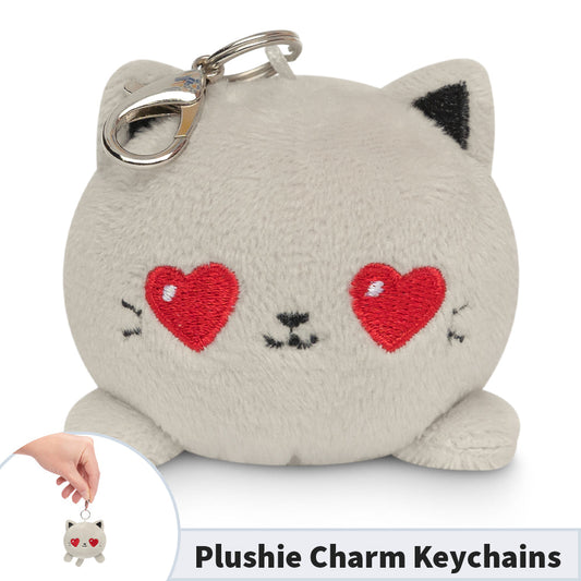 A Cat Plushie Charm Keychain with a heart-shaped charm keychain is holding a portable key ring. Brand: TeeTurtle