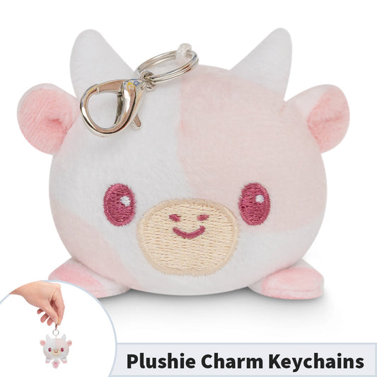 A portable TeeTurtle Cow Plushie Charm Keychain.