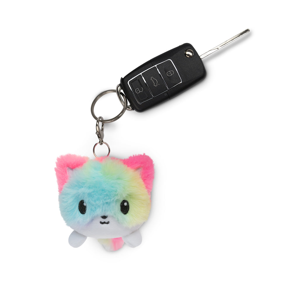 Portable fox plushie charm keychain that you can clip onto bags. (Brand: TeeTurtle)