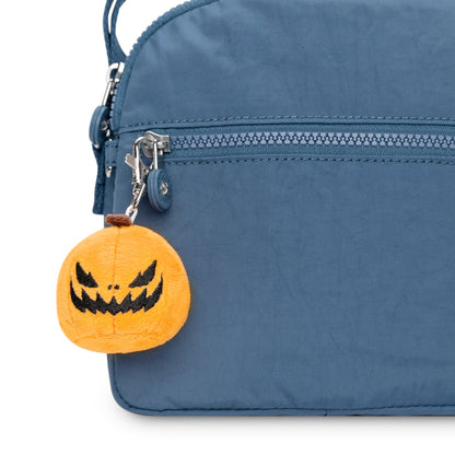 A portable Jack-o-Lantern Plushie Charm Keychain with a jack-o-lantern design by TeeTurtle.