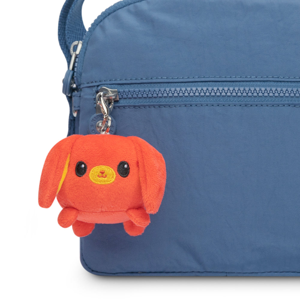 A Lunar New Year Rabbit Plushie Charm Keychain from TeeTurtle, with a small stuffed animal attached to it, portable and in the Lunar New Year collection.