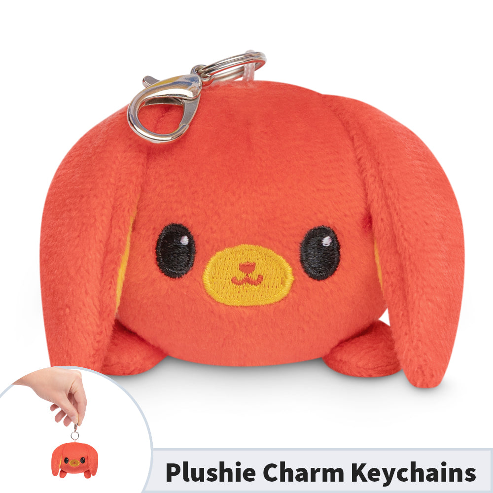 A portable TeeTurtle Lunar New Year Rabbit Plushie Charm Keychain.