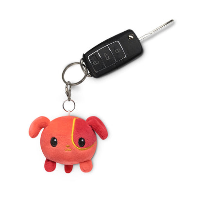 A portable Lunar New Year Dog Plushie Charm Keychain perfect for Lunar New Year celebrations. (Brand: TeeTurtle)