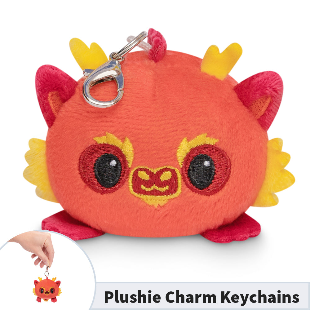 A portable red and yellow Lunar New Year Dragon Plushie Charm Keychain, perfect for TeeTurtle.