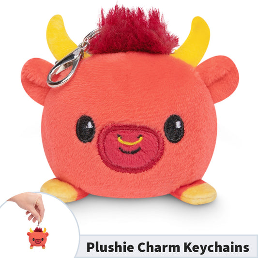 A TeeTurtle Lunar New Year Ox plushie charm keychain with a red horn on it.