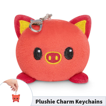 Portable Lunar New Year Pig Plushie Charm Keychain from the TeeTurtle collection.