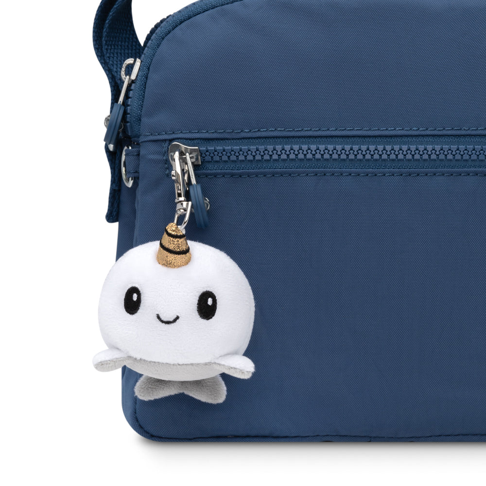 A portable keychain with a Narwhal Plushie Charm Keychain.