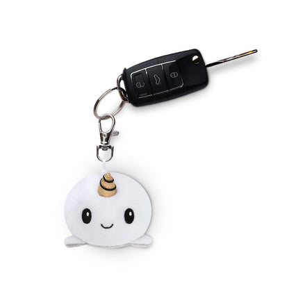 A portable Narwhal Plushie Charm Keychain featuring a narwhal by TeeTurtle.