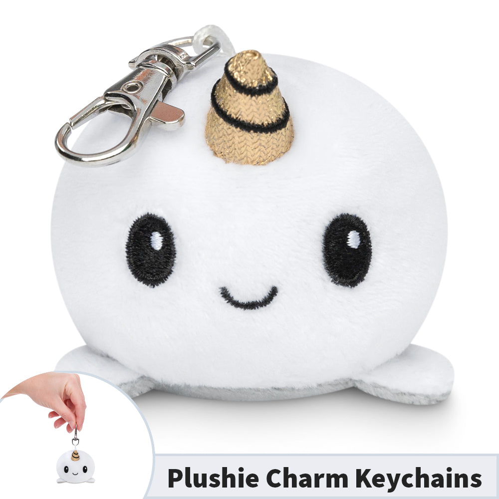 A portable TeeTurtle Narwhal Plushie Charm Keychain.