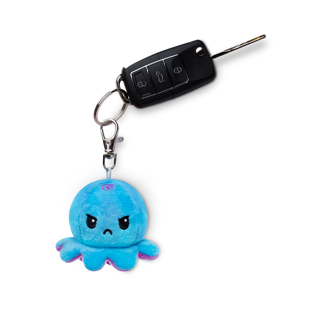 A blue Octopus Plushie Charm Keychain with a pink octopus on it, featuring a carabiner, from TeeTurtle.