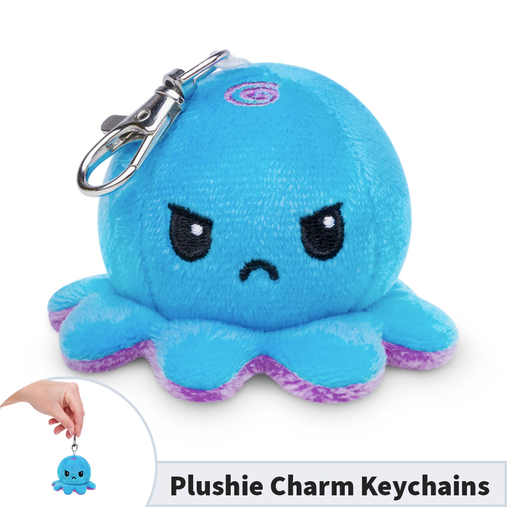 A portable Octopus Plushie Charm Keychain in the shape of a blue octopus from TeeTurtle.