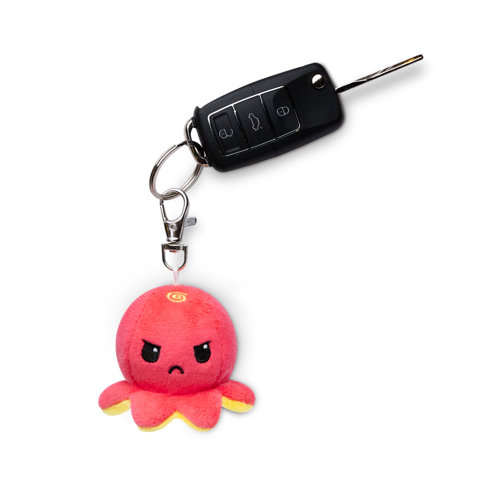 A portable Octopus Plushie Charm Keychain featuring a pink octopus by TeeTurtle.