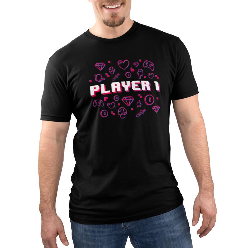 Premium Cotton T-shirt_Teeturtle Player 1 black t-shirt featuring "Player 1" text in block font surrounded by various gaming icons such as controllers, diamonds, hearts, mushrooms, coins, and swords.