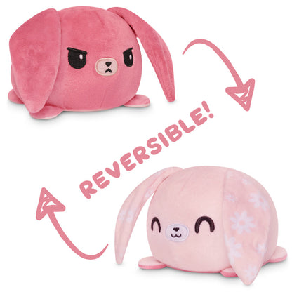 Two Reversible Bunny Plushies by TeeTurtle that can express emotions.