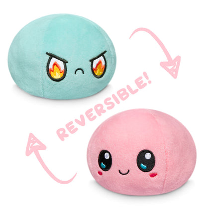 Two TeeTurtle Reversible Ball Plushies that express emotions.