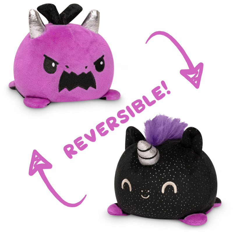 Two Reversible Unicorn & Dragon Plushies with black and purple colors by TeeTurtle.