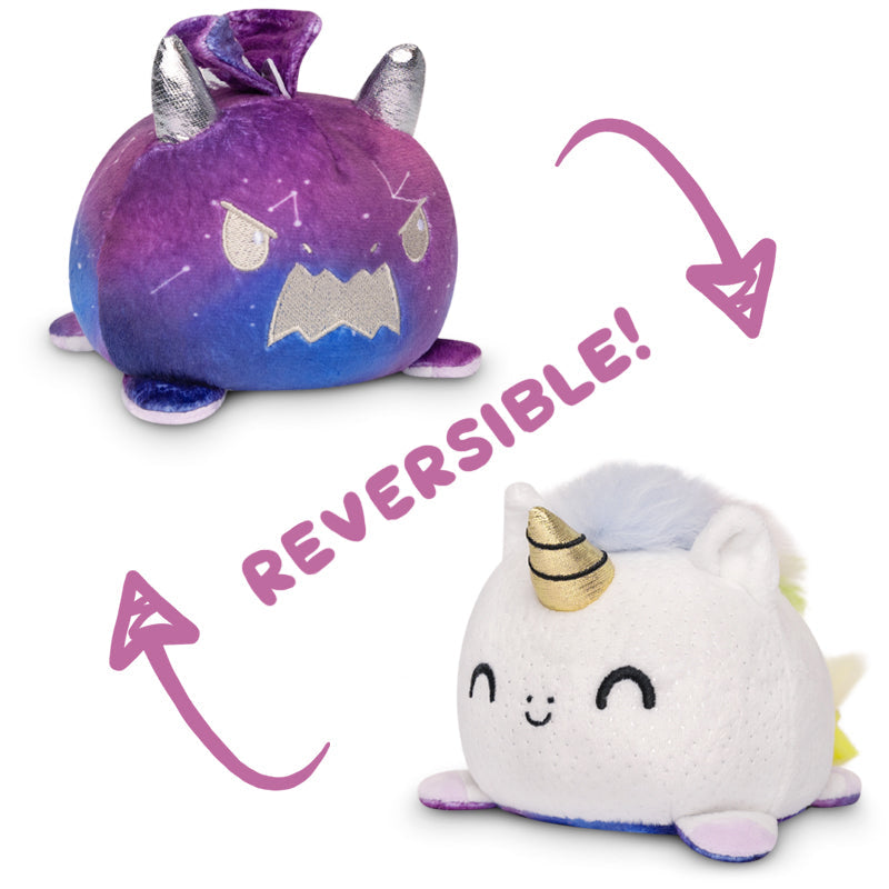 Two Reversible Unicorn & Dragon Plushies by TeeTurtle with the words "reversible" on them.