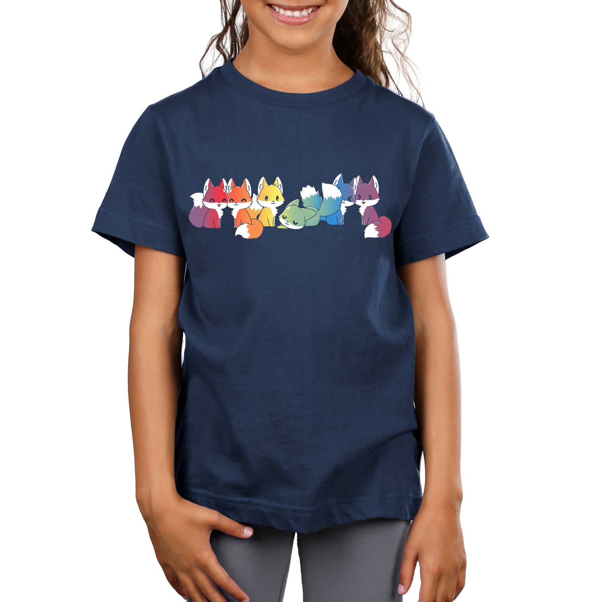 Premium Cotton T-shirt_Illustration of seven cartoon foxes in a line, each in a different color: red, orange, yellow, green, blue, indigo, and purple against a dark background on a Navy Blue apparel from monsterdigital's Rainbow Foxes collection.