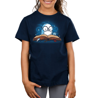 Premium Cotton T-shirt_TeeTurtle navy blue Reading is Magical. Featuring a white owl reading a book.