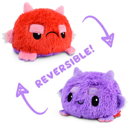 Two TeeTurtle Reversible Fuzzy Monster Plushies.